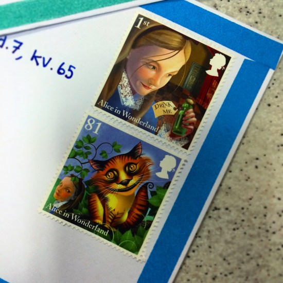 Postcard. Letter. Stamp. Alice in Wonderland.