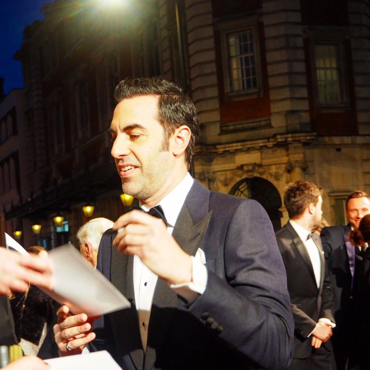 Sacha Baron Cohen signing on the #EEBAFTAs Red Carpet 2016 taken on an Olympus OMD EM10